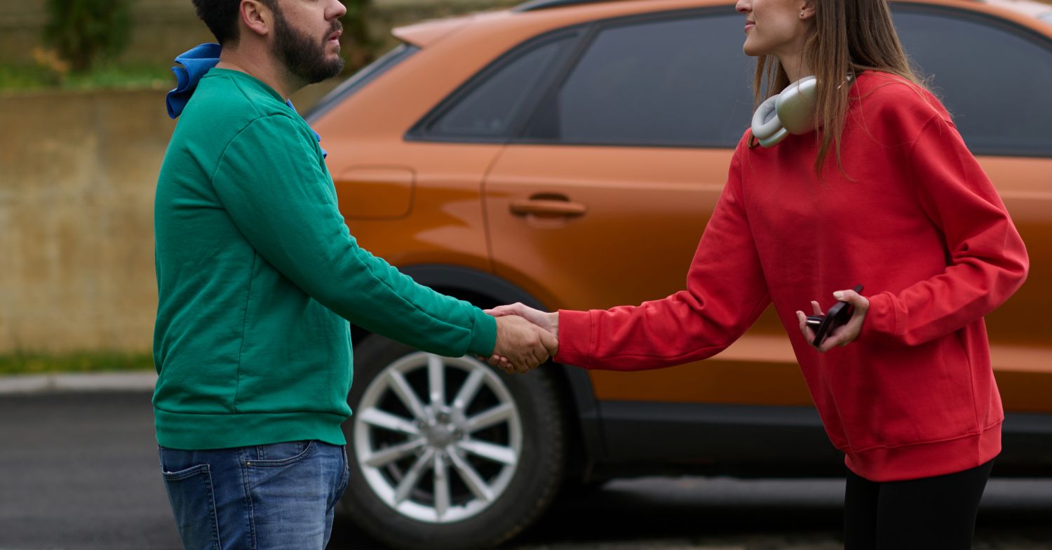 woman selling her used car